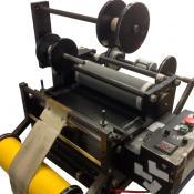 Vinyl Puncher that punches holes for use in a Gerber Plotter